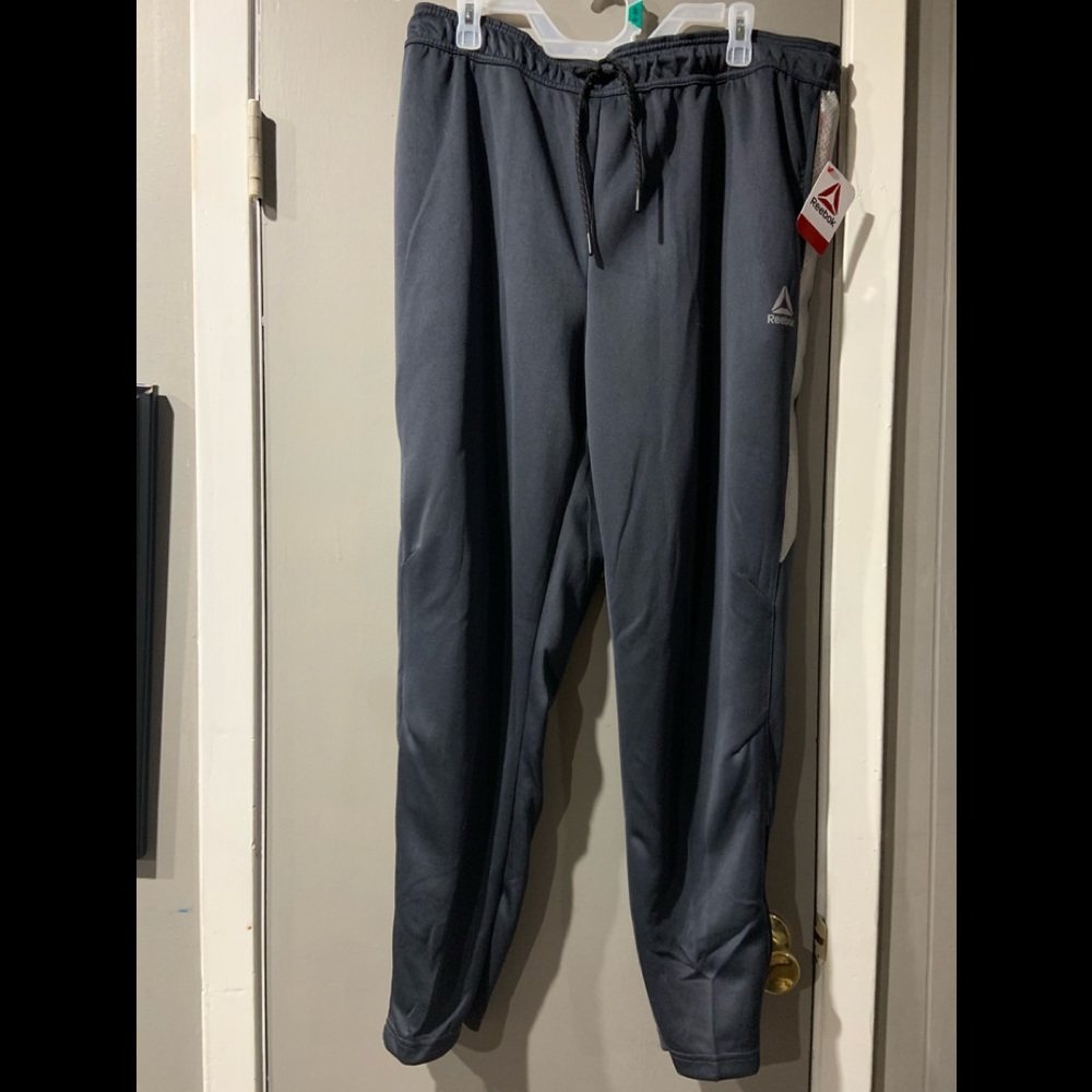 Reebok joggers/ track pants, grey with reflective strip on side, XL.